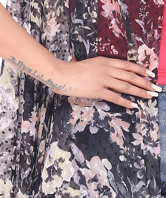 Close-up of a 100% polyester floral printed women’s vest showcasing detailed fabric texture and floral pattern design.