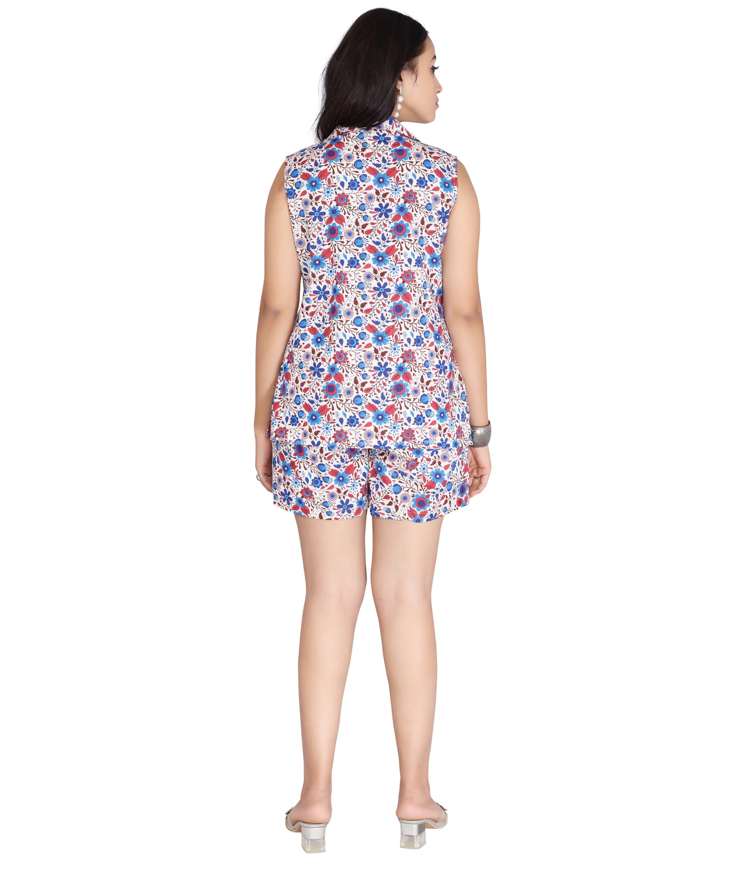 Back view of a high-quality polyester sleeveless co-ord set featuring a floral print blazer-style top and matching shorts.