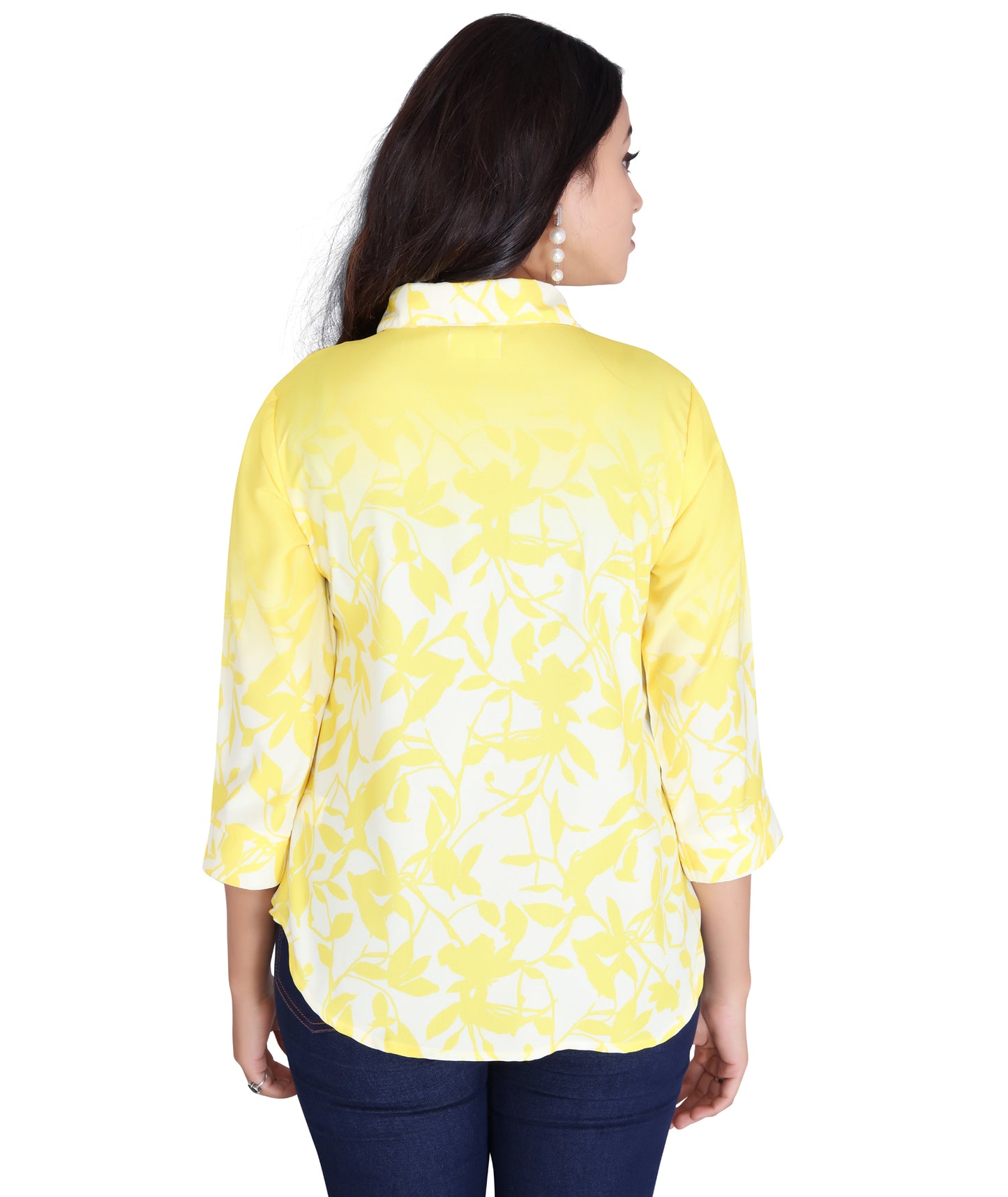 Back view of a yellow printed polyester top with a relaxed fit and 3/4th sleeves.