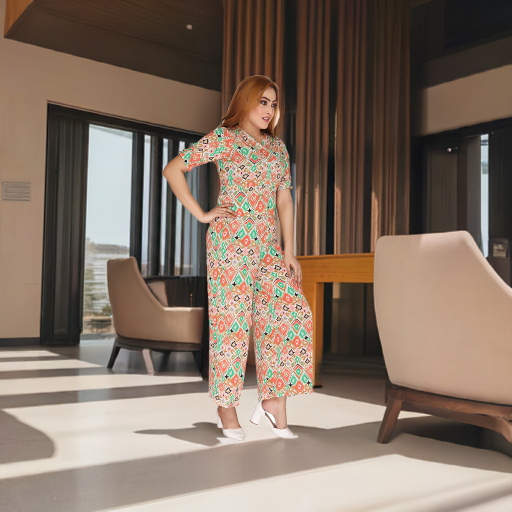 Lifestyle shot of a 100% crepe rayon top and pant co-ord set in a modern interior, displaying its elegance and vibrant design.