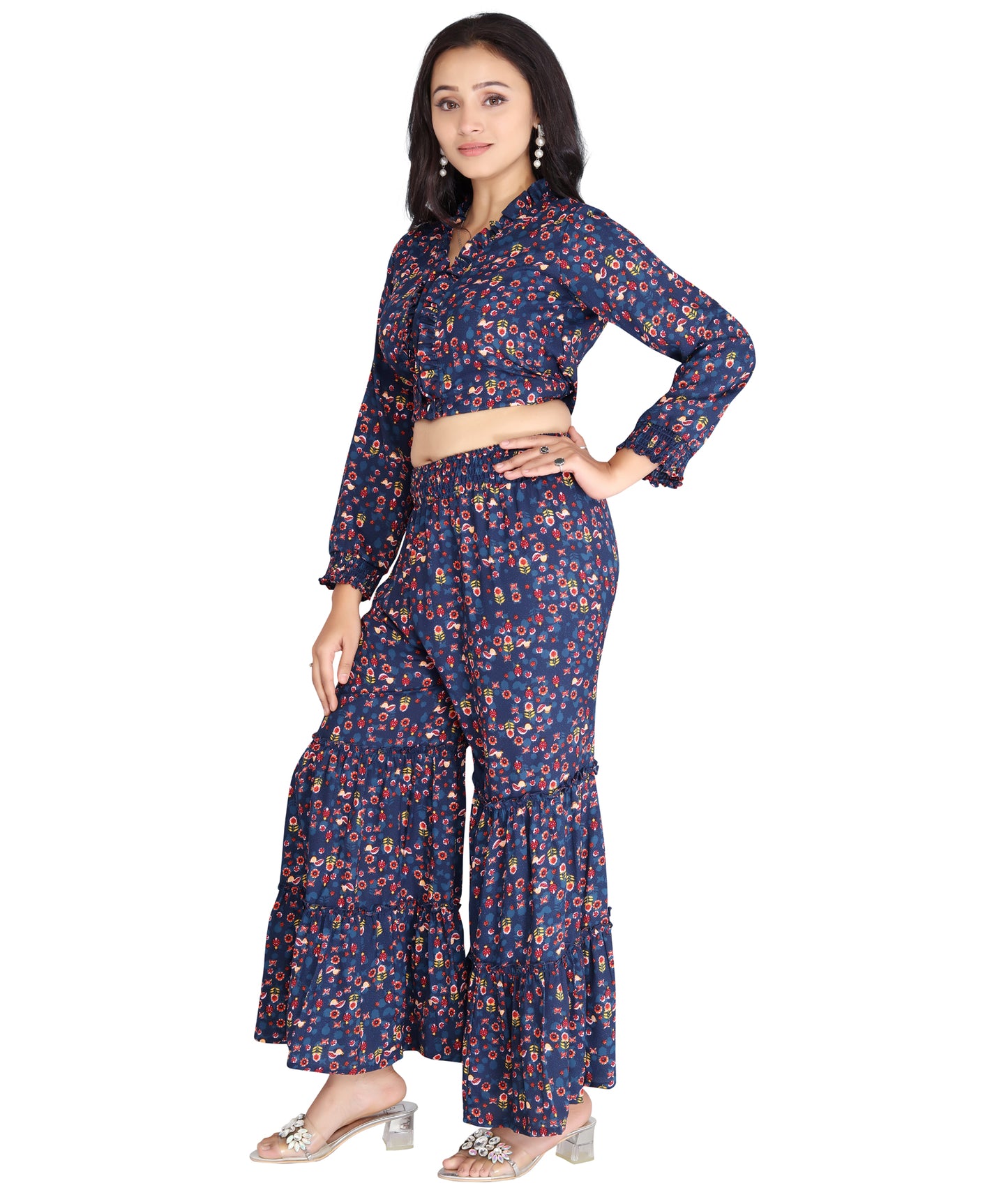 Side view of a high-quality polyester printed co-ord set with a cropped top and wide-leg tiered flared pants.